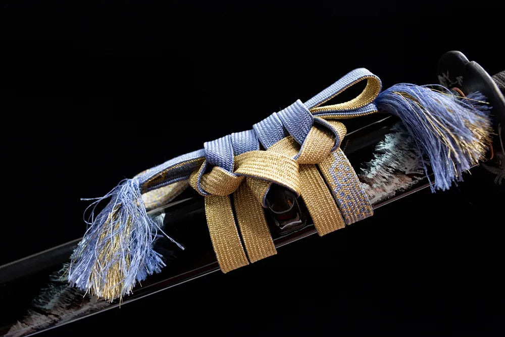 Blue gold mixed tassel sage cord macro close-up