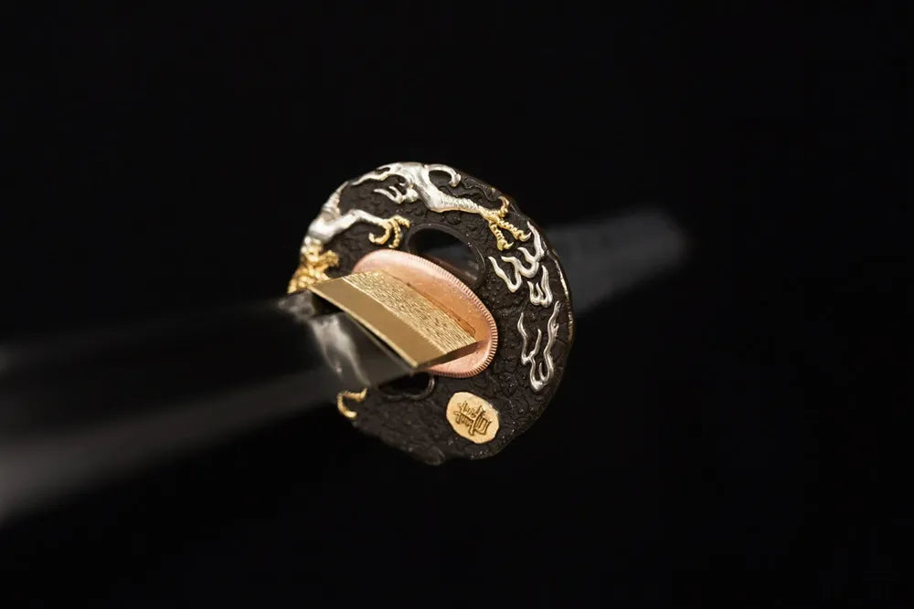 Front open‑work raijin‑thunder‑cloud‑relief two‑tone aged‑copper katana hand‑guard close‑up