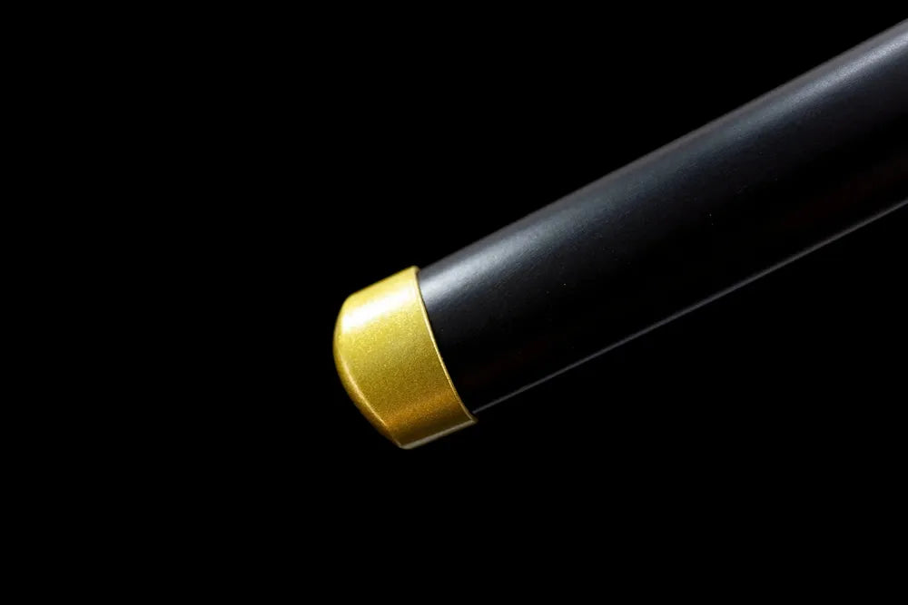 Bottom black baking‑paint saya golden alloy end‑cap close‑up