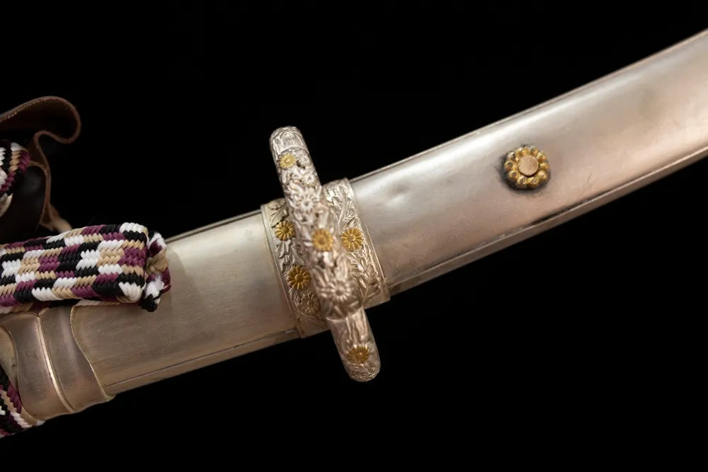 Floral‑cluster‑relief silver‑plated copper fuchi grip‑ring macro close‑up