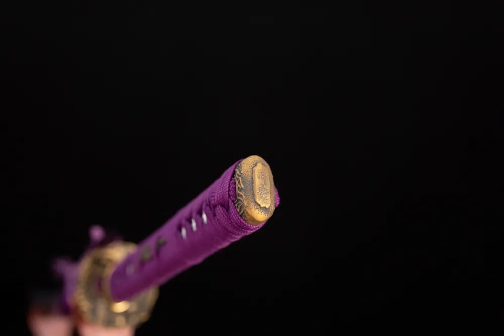 3D‑sculpted purple‑cloud‑aura‑scroll aged‑copper pommel‑cap detail shot