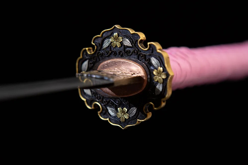 Front black base gold floral carved hand guard