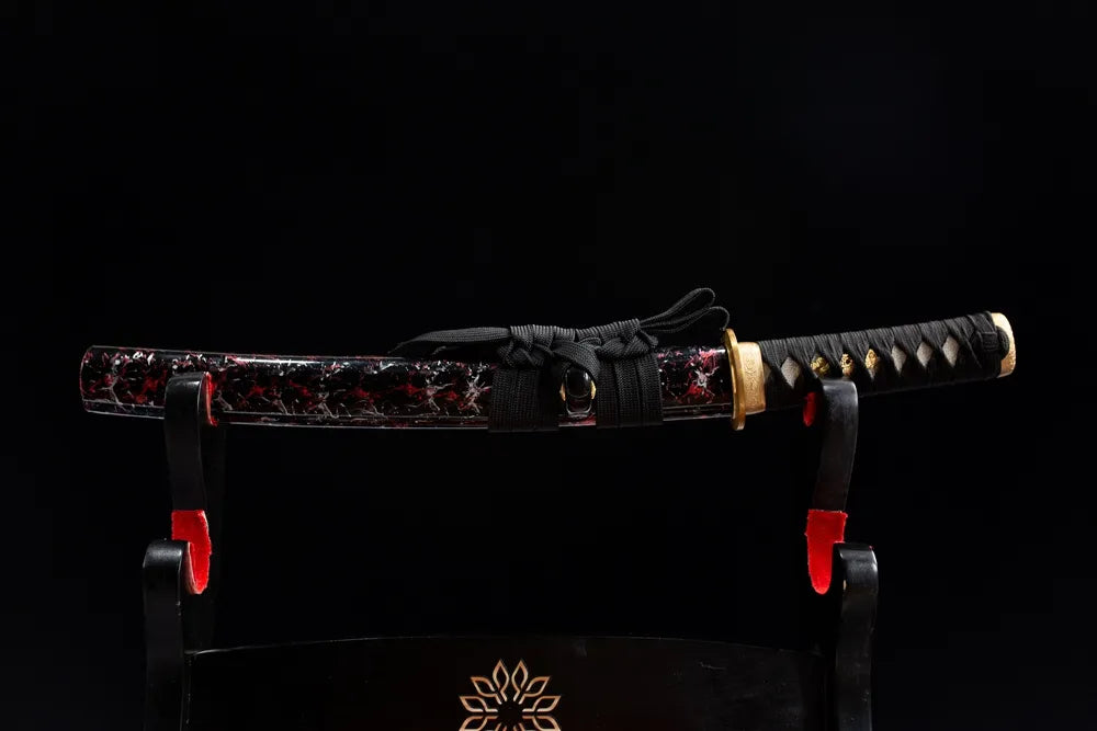 Horizontal laid closed blood marble mini samurai wakizashi