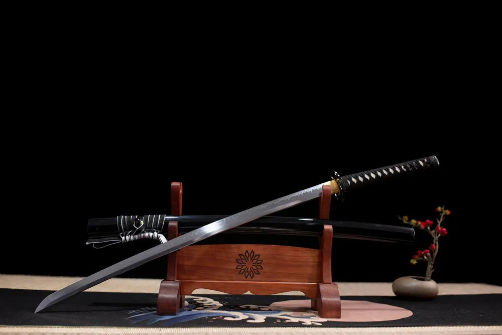 Slanted upright drawn Black‑Widow‑Katana spider‑horror‑motif katana wooden shelf front perspective