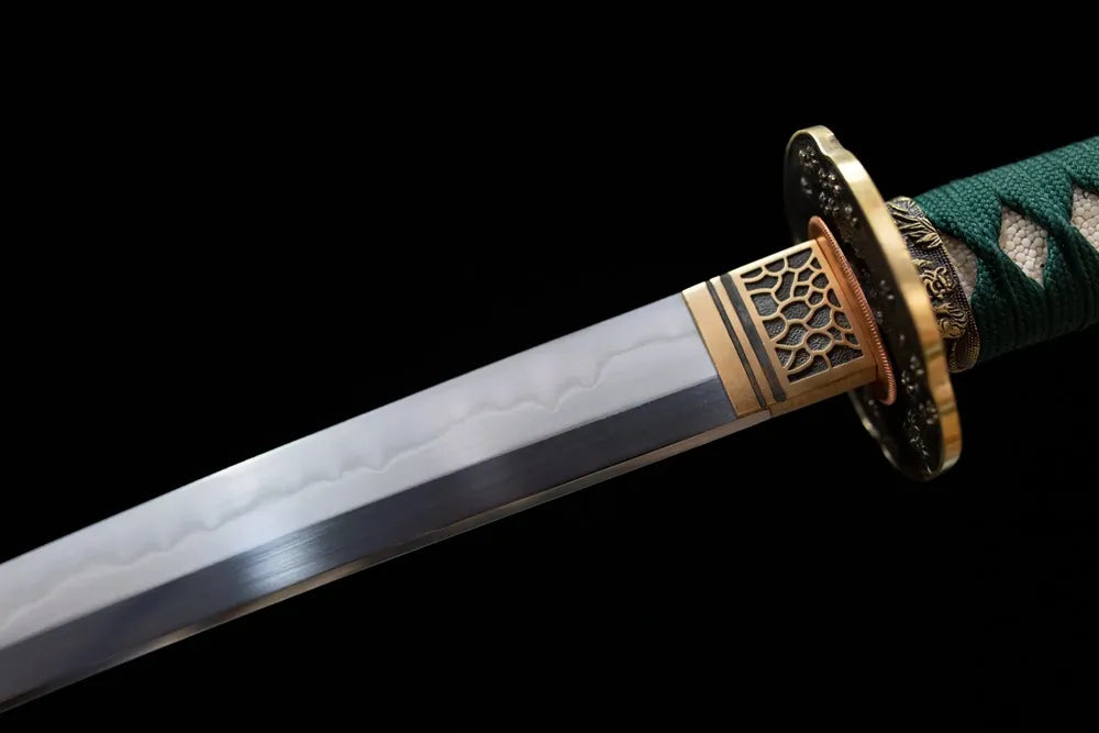 Upper T10 clay‑tempered katana blade brass habaki midare‑gunome undulating hamon temper‑line macro close‑up