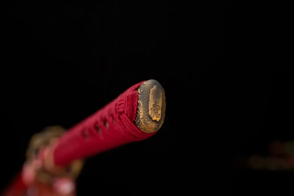 3D‑engraved purgatory‑hannya‑demon antique‑copper pommel‑cap detail shot