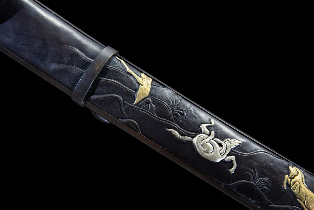 Carving the back of the scabbard