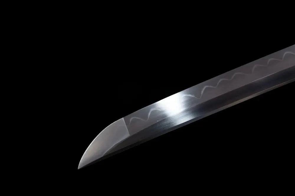 Traditional military‑style kissaki tip of 98‑style saber blade close‑up view