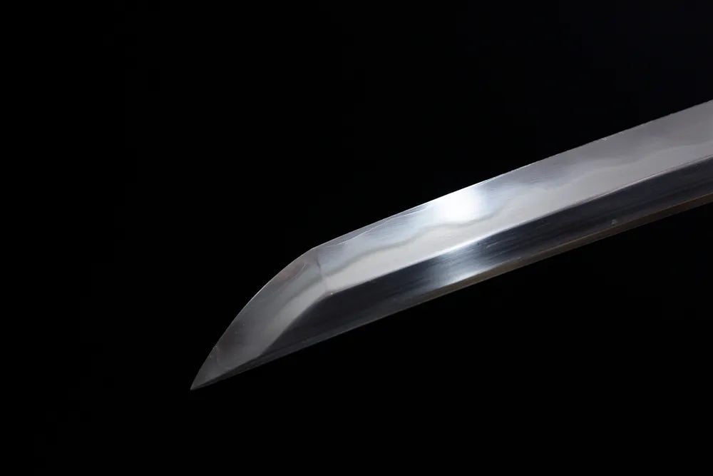 Compact functional wakizashi‑style kissaki tip of Silver‑Bamboo‑Wakizashi blade close‑up view