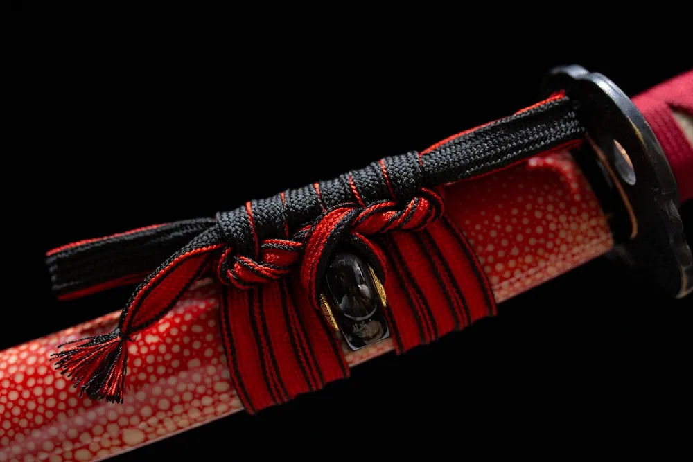 Thick black‑red mixed‑braided sageo cord black‑gold gilded fitting macro close‑up