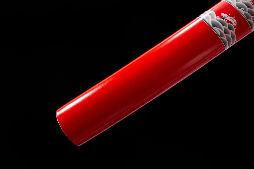 Bottom smooth red solid wood saya end cap close-up