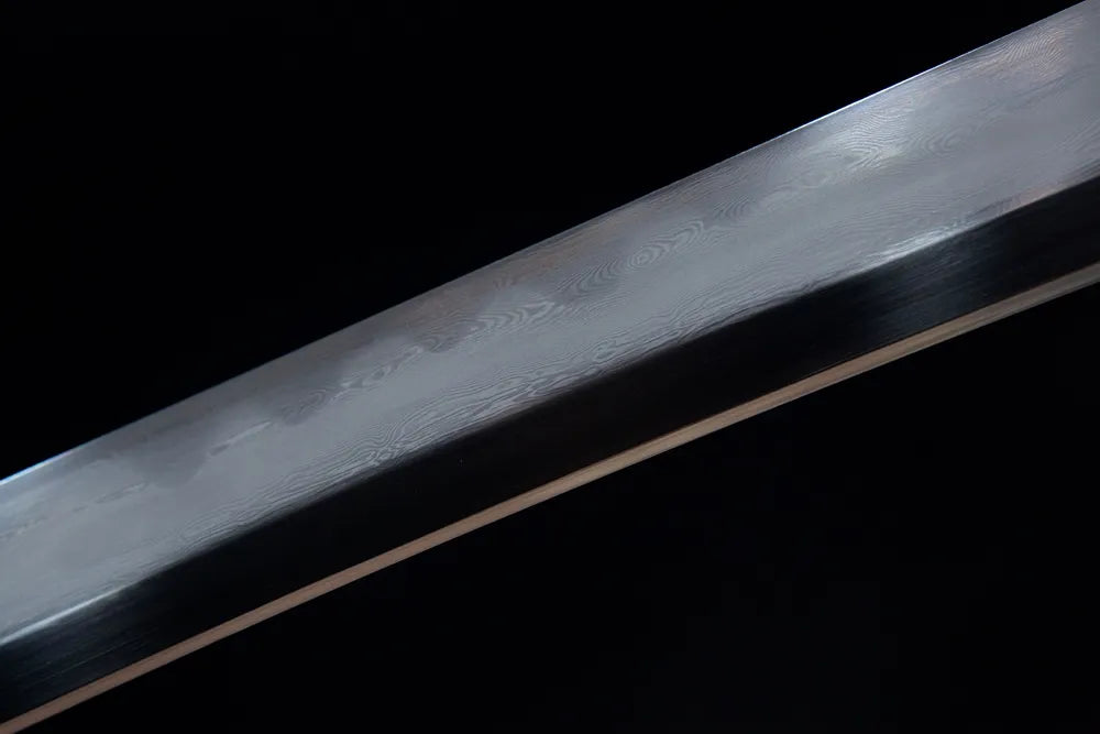 Middle blade detail continuous rounded gunome temper grain polished T10 steel surface