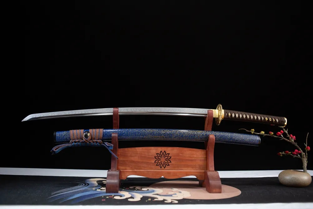 Flat lay fully drawn T10 choji clay tempered blade