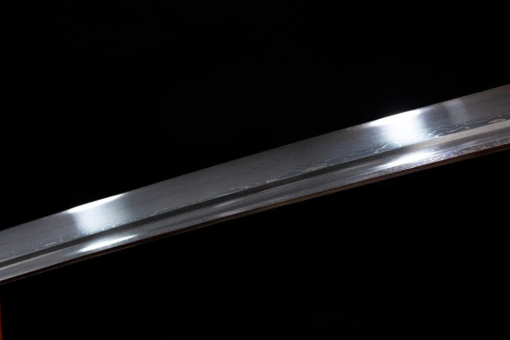 Mid‑section midare‑gunome butterfly‑scale‑powdery fragmented‑surge‑pattern hamon steel katana blade surface close‑up shot