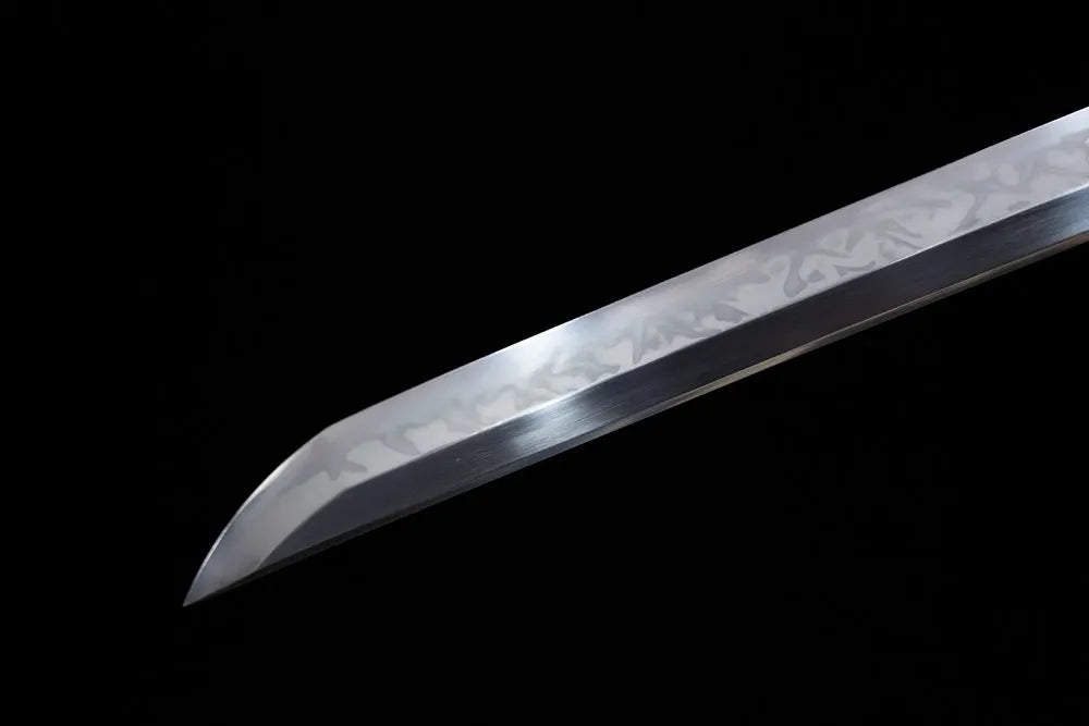 Classic functional katana‑style kissaki tip of Dragon‑Slash‑Katana blade close‑up view
