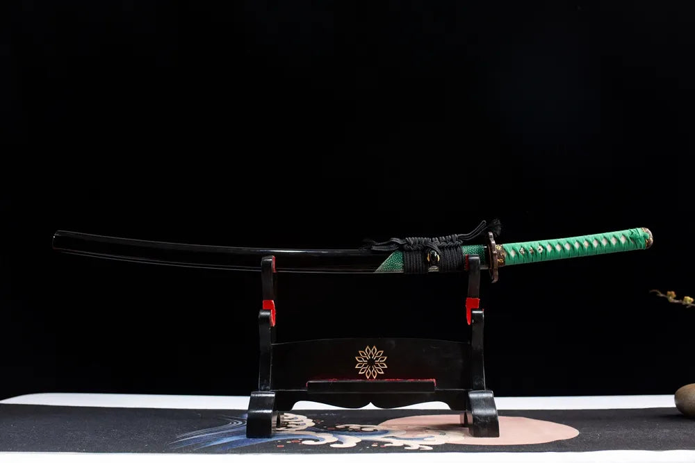 Horizontal laid closed black lacquer sun moon samurai sword