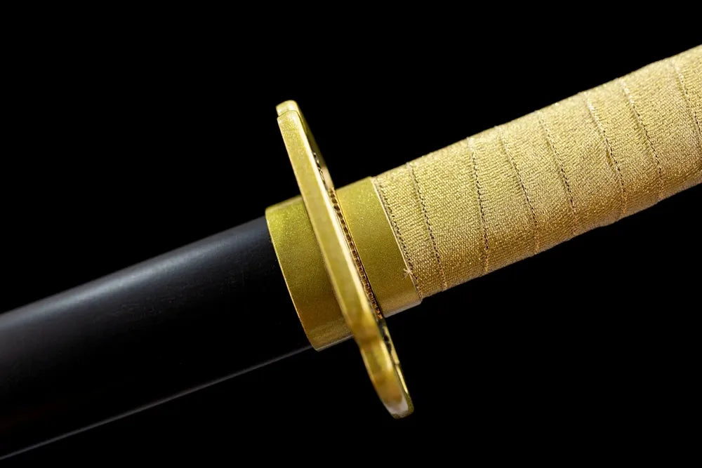 Polished golden alloy fuchi grip‑ring macro close‑up