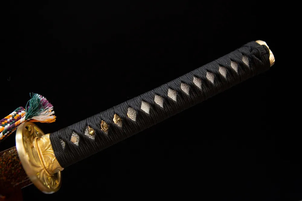 Full black ito wrapped tsuka golden fittings front view