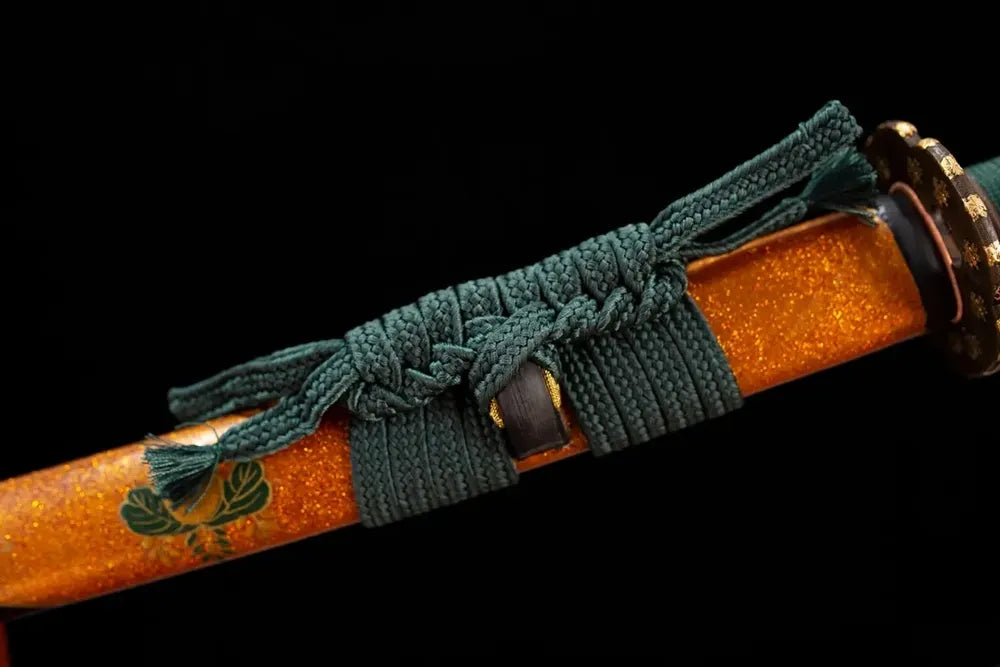 Thick deep‑green mixed‑braided sageo cord gilded‑bronze fitting macro close‑up
