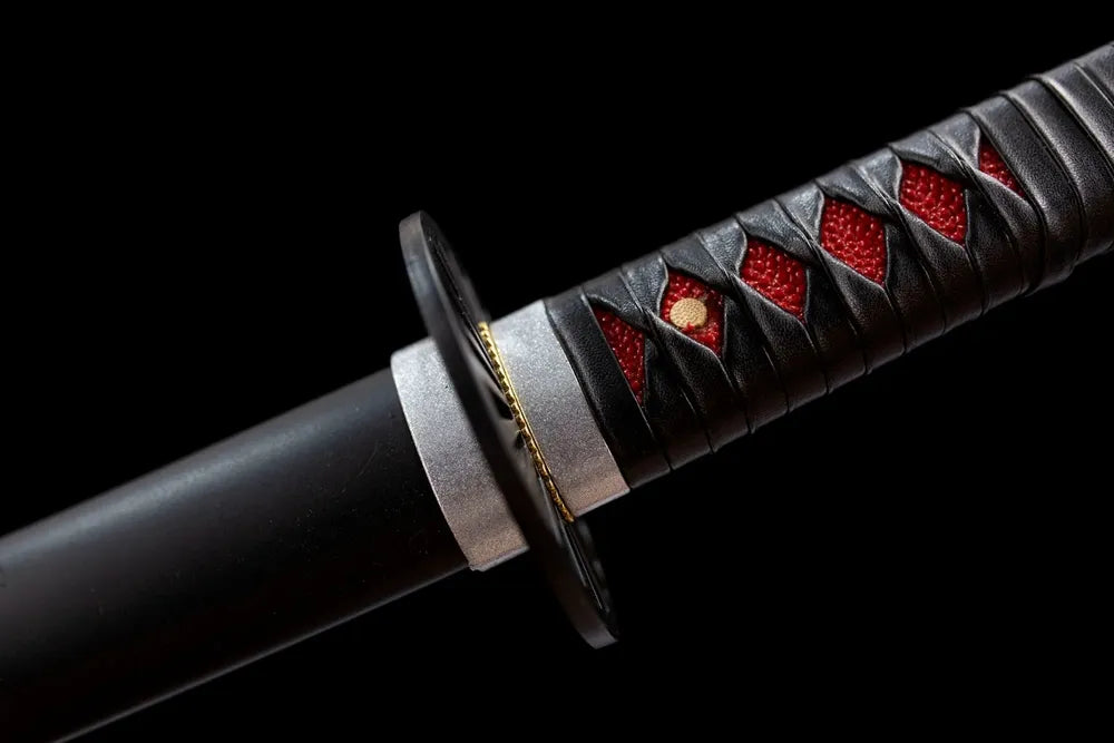 Red accent alloy fuchi tsuka collar macro close‑up front view