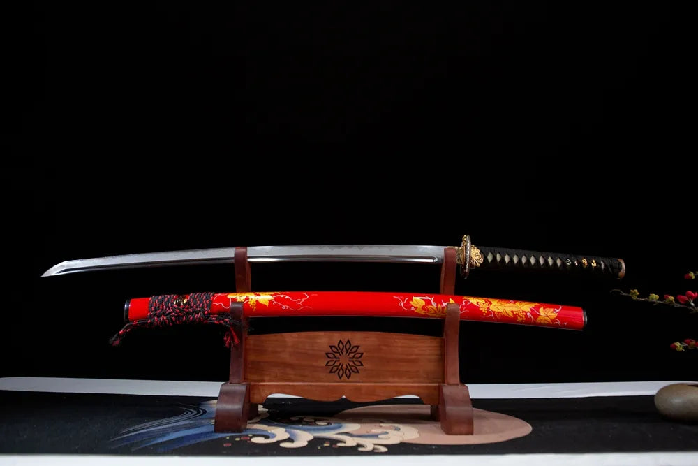 Flat lay fully drawn T10 choji clay tempered blade