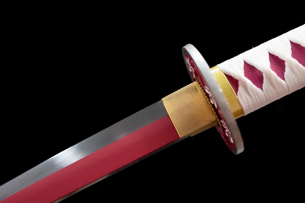 Upper 1060 steel blade sakura‑decor habaki macro close‑up
