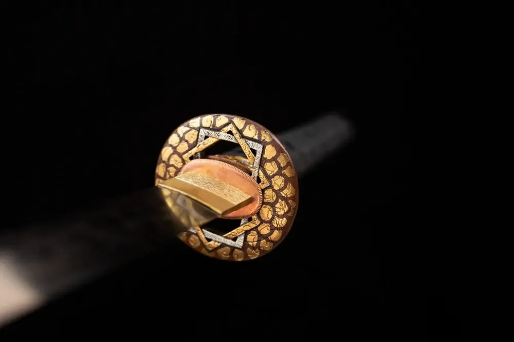 Front open‑work peacock‑tail‑feather‑relief gold‑silver‑plated copper katana hand‑guard close‑up