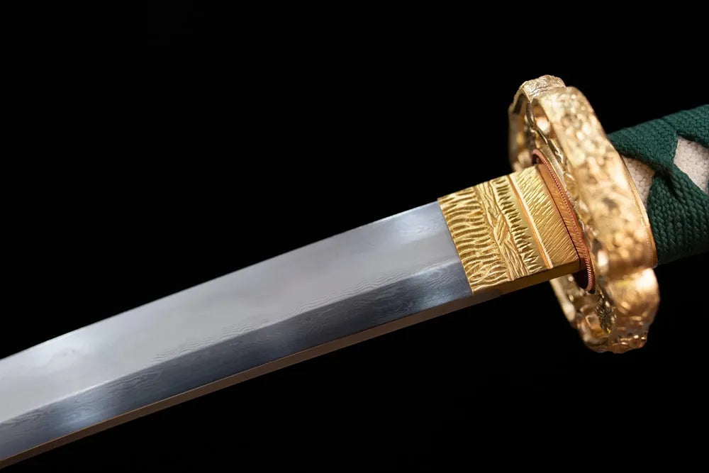 Upper T10 clay‑tempered tachi blade brass habaki gunome‑midare sengoku‑sharp layered undulating hamon temper‑line macro close‑up