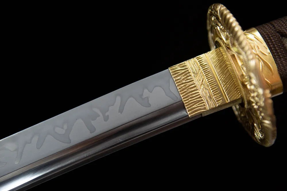 Upper choji wave hamon & golden habaki blade close-up