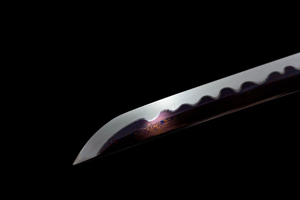Sharp traditional kissaki tip of Lion‑Chop katana blade close‑up view