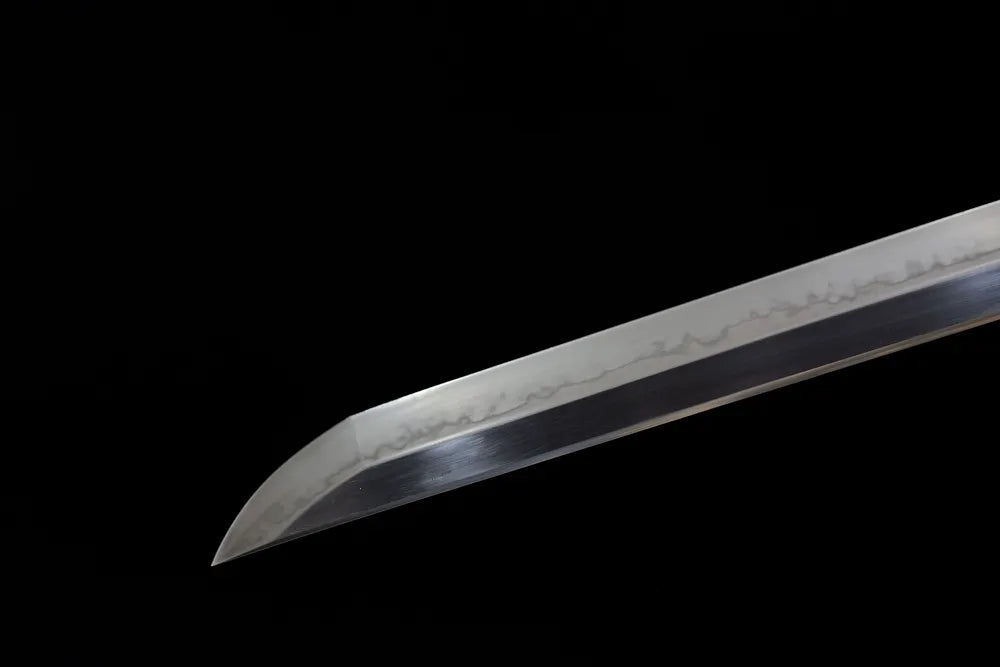 Classic sharp kissaki tip of Destruction‑Shirasaya katana blade close‑up view