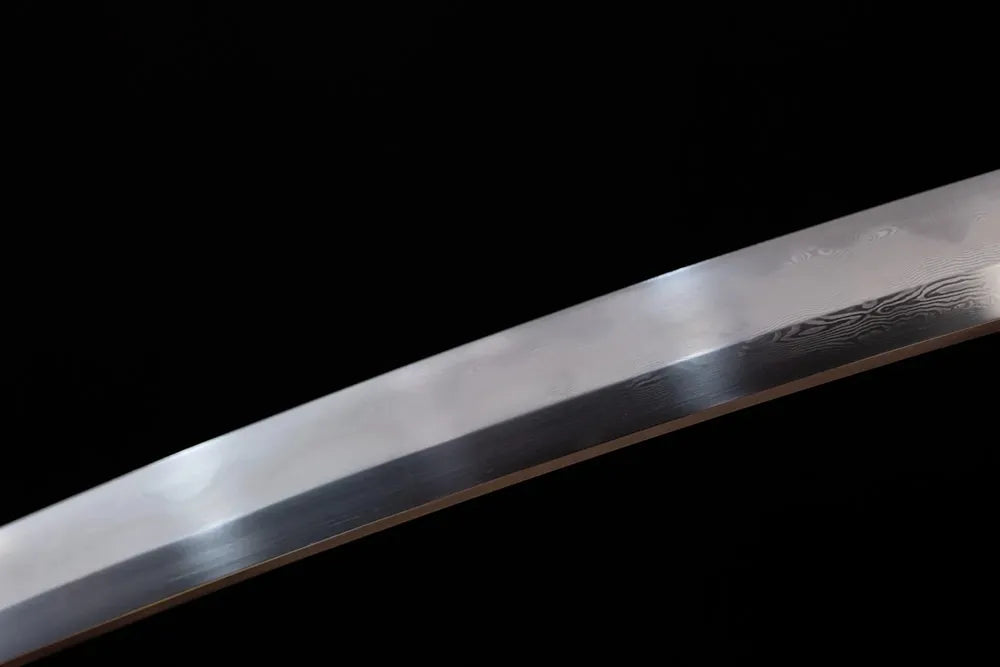 Mid‑section gunome‑midare sengoku‑sharp layered‑undulating‑pattern hamon steel tachi blade surface close‑up shot