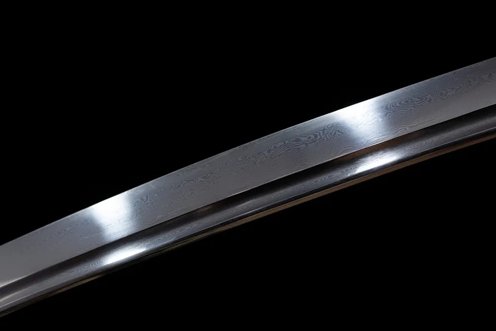 Mid‑section notare‑gunome undulating‑pattern hamon steel wakizashi blade surface close‑up shot