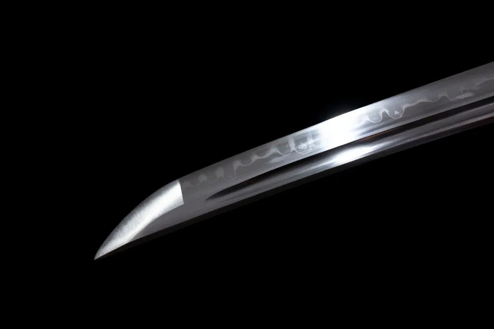 Compact functional wakizashi‑style kissaki tip of Wakizashi‑Blue‑Bamboo blade close‑up view