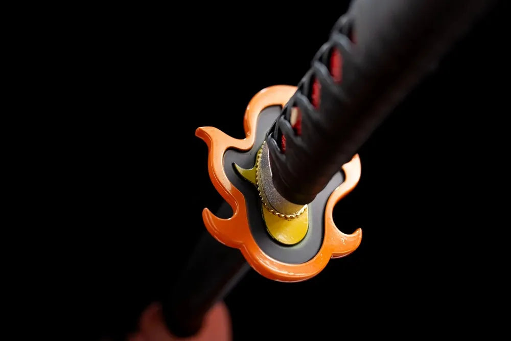 Reverse orange flower‑outline alloy tsuba surface texture