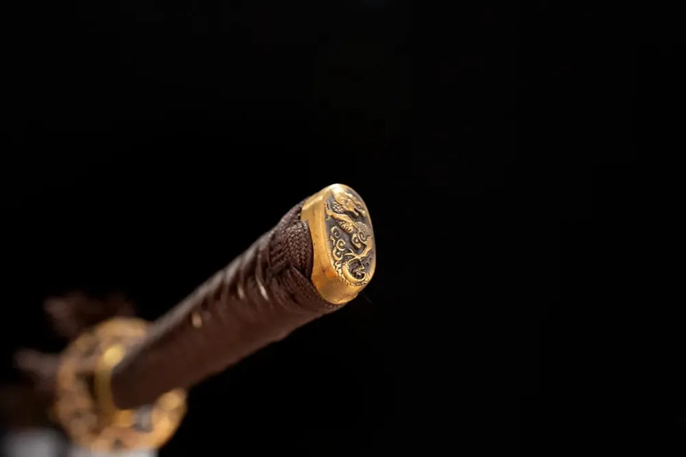 3D‑sculpted wraith‑fallen‑samurai‑relic dark‑aged‑bronze pommel‑cap detail shot