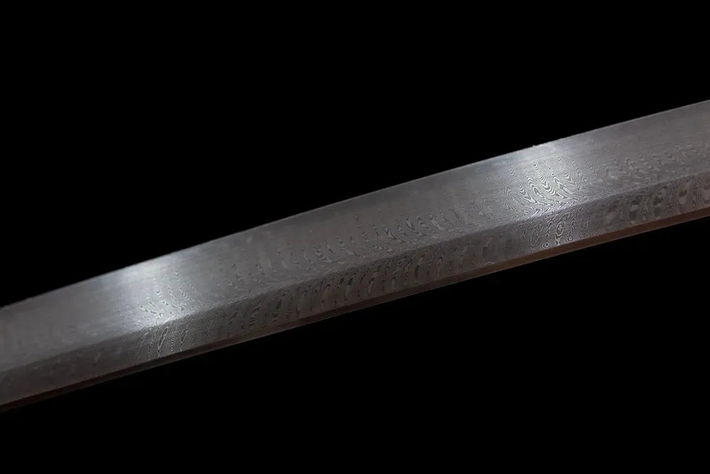 Mid‑section multi‑layer damascus folded grain steel tachi blade surface close‑up shot