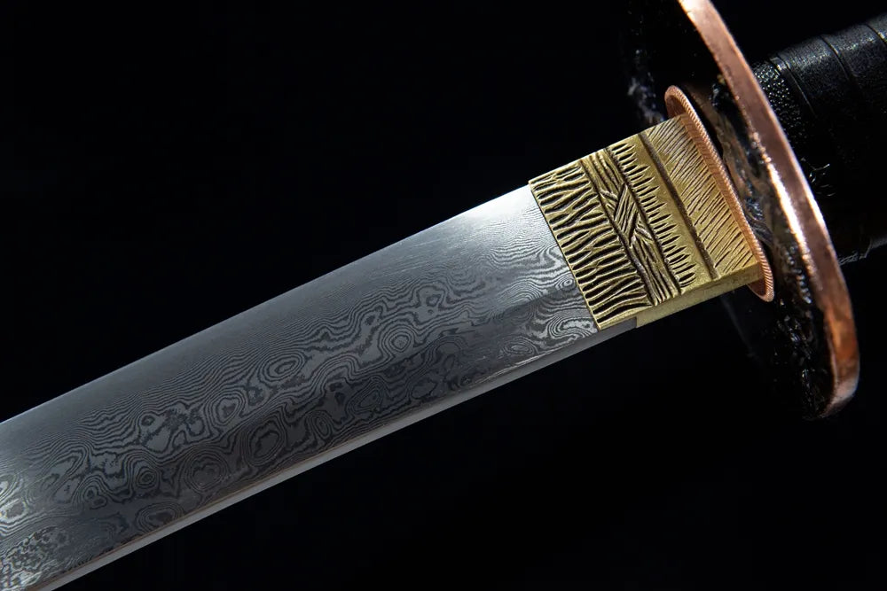 Upper damascus steel blade close-up