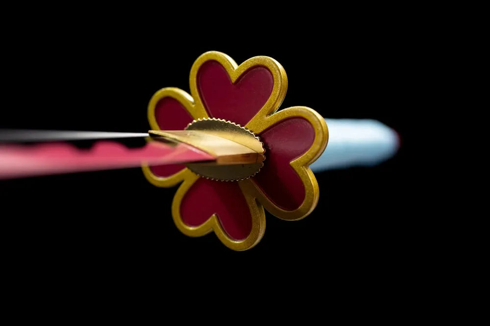 Front golden‑trim sakura‑flower love‑hashira demon‑slayer hand‑guard close‑up