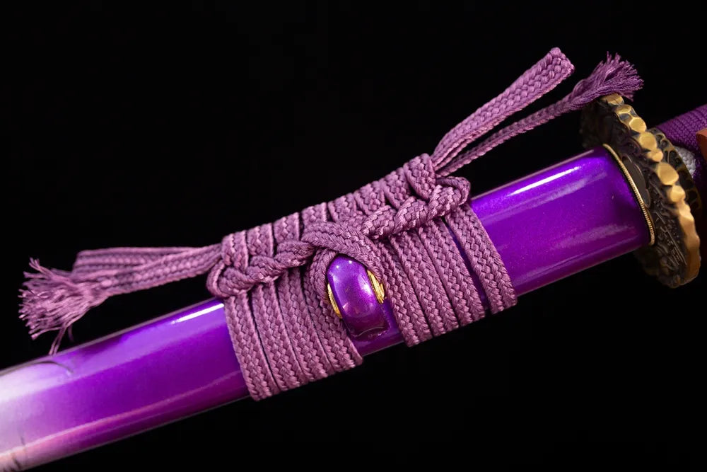 Thick deep‑purple coarse‑cotton‑braided sageo cord aged‑copper fitting macro close‑up