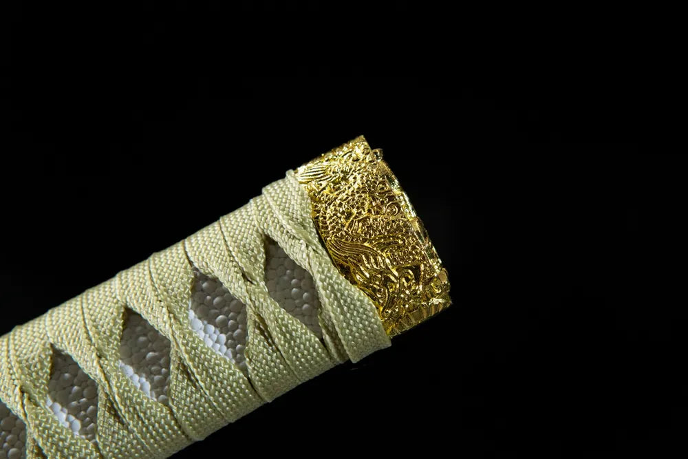 Upper tsuka closeup dark red diamond moro cotton woven texture