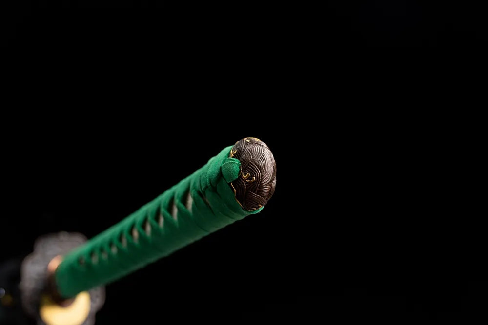 3D wave embossed bronze pommel cap detail