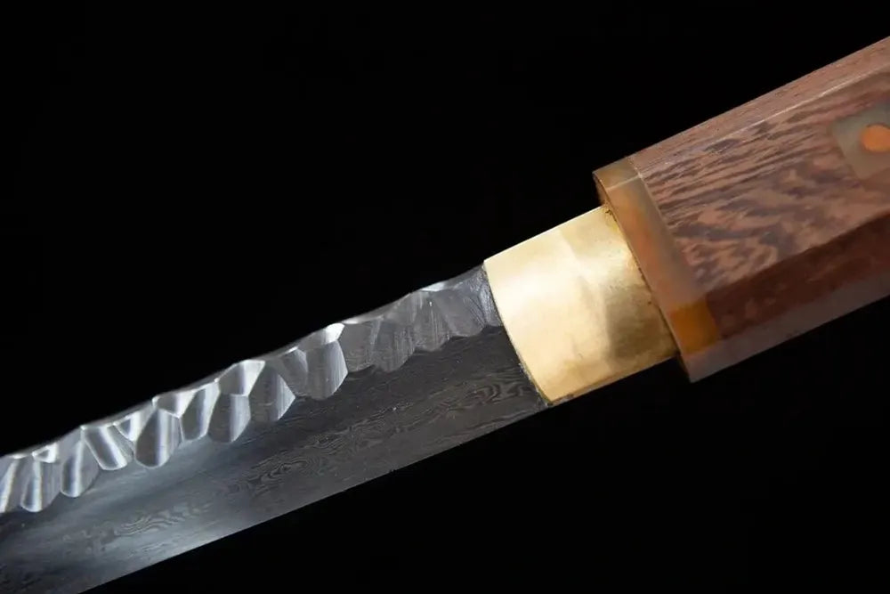 Upper damascus folded grain blade close-up