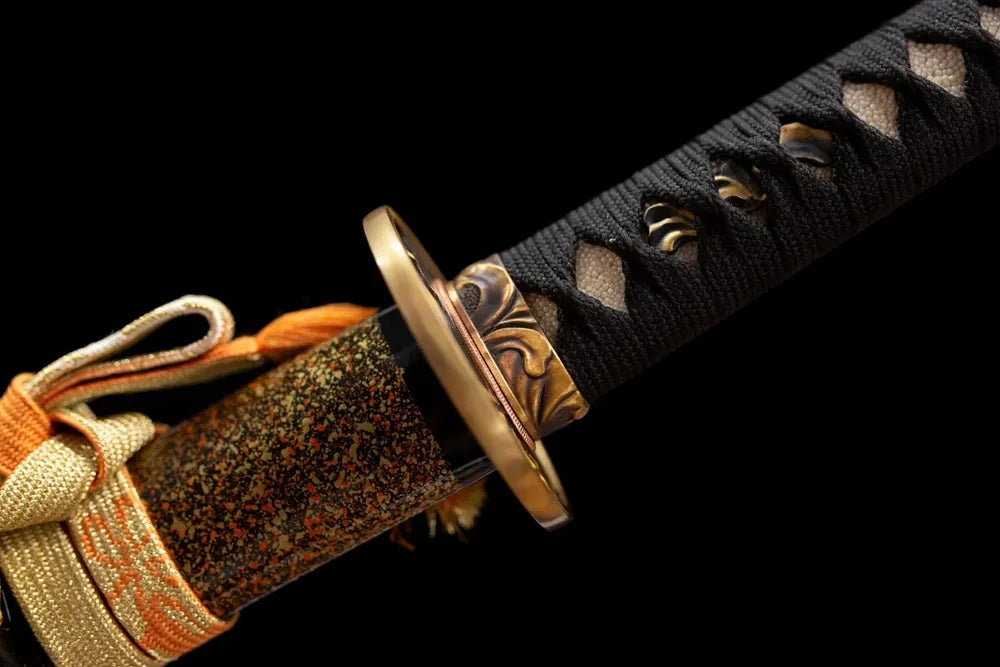 Yoshino‑sakura‑carved brass‑alloy fuchi grip‑ring macro close‑up