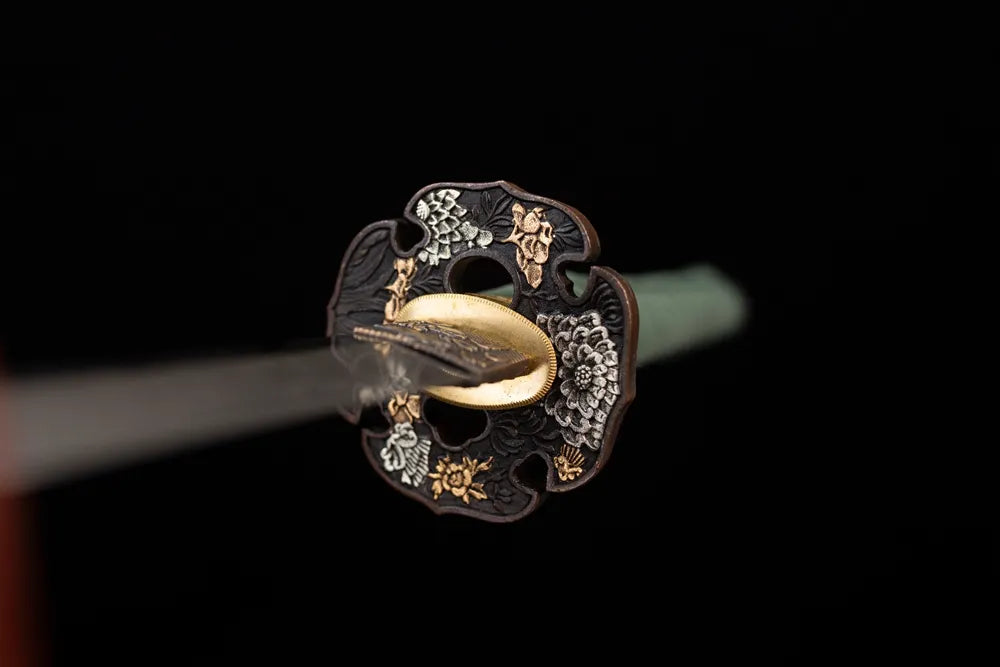 Front open‑work wind‑bell‑eaves‑chime‑relief aged‑copper katana hand‑guard close‑up