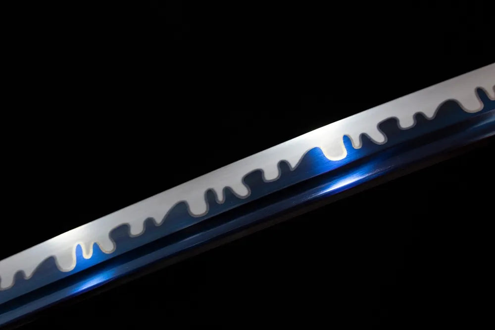 Mid‑section suguha‑gunome plum‑snow‑falling‑pattern hamon blue‑tempered steel katana blade surface close‑up shot
