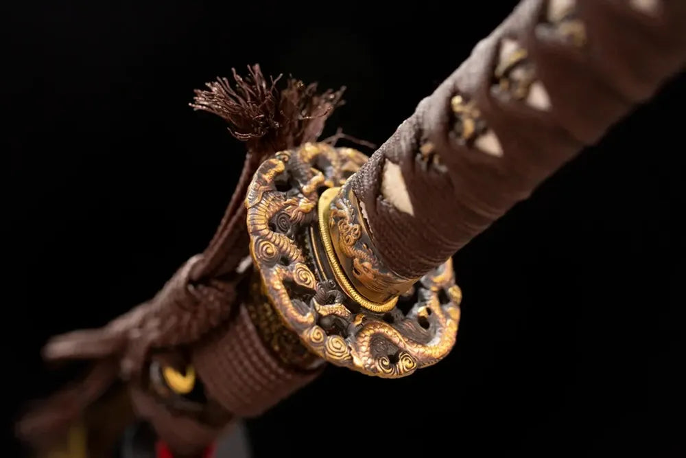 Reverse‑side fallen‑battle‑relic‑scroll carving dark‑aged‑bronze tsuba surface texture close‑up