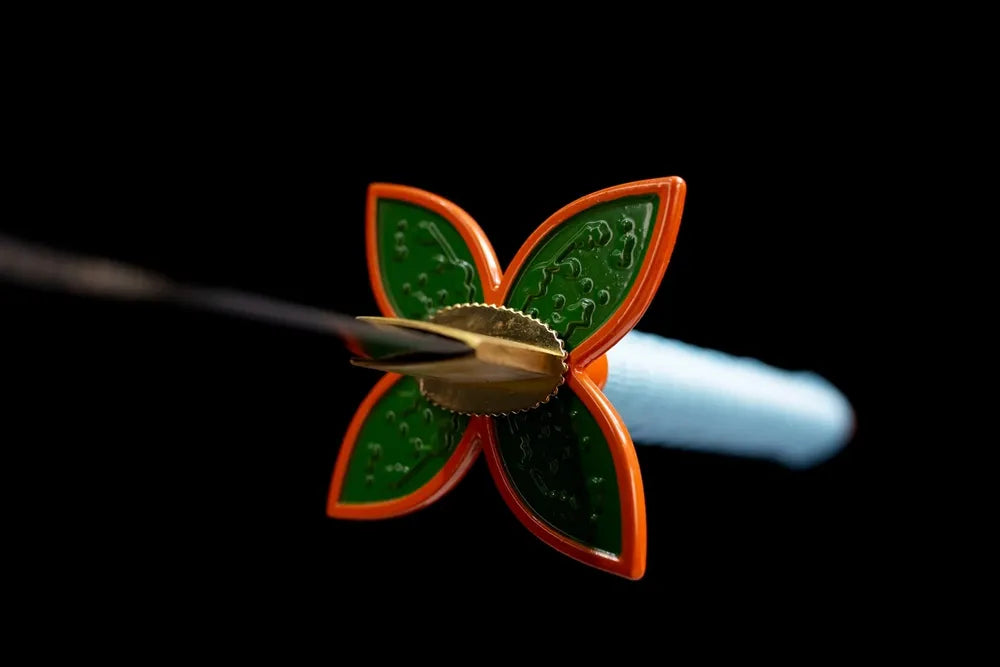 Front hollow delicate butterfly‑cutout light‑toned alloy insect‑hashira hand‑guard close‑up
