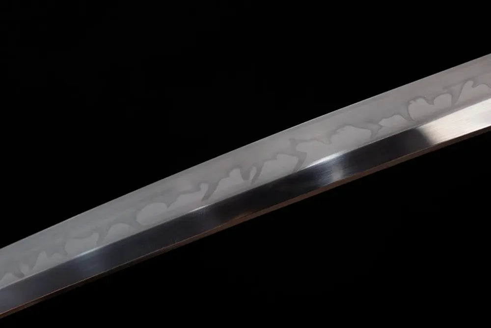 Mid‑section midare‑sanbonsugi sea‑dragon‑surge‑undulating‑pattern hamon steel katana blade surface close‑up shot