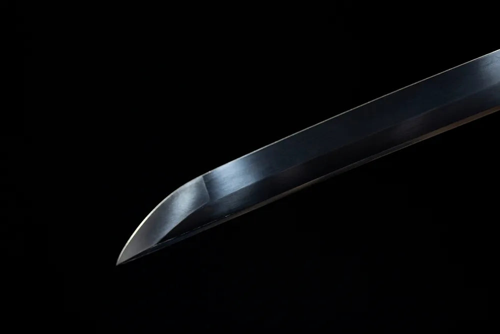 Sharp traditional kissaki tip of Skeleton‑Demon‑King‑Katana blade close‑up view
